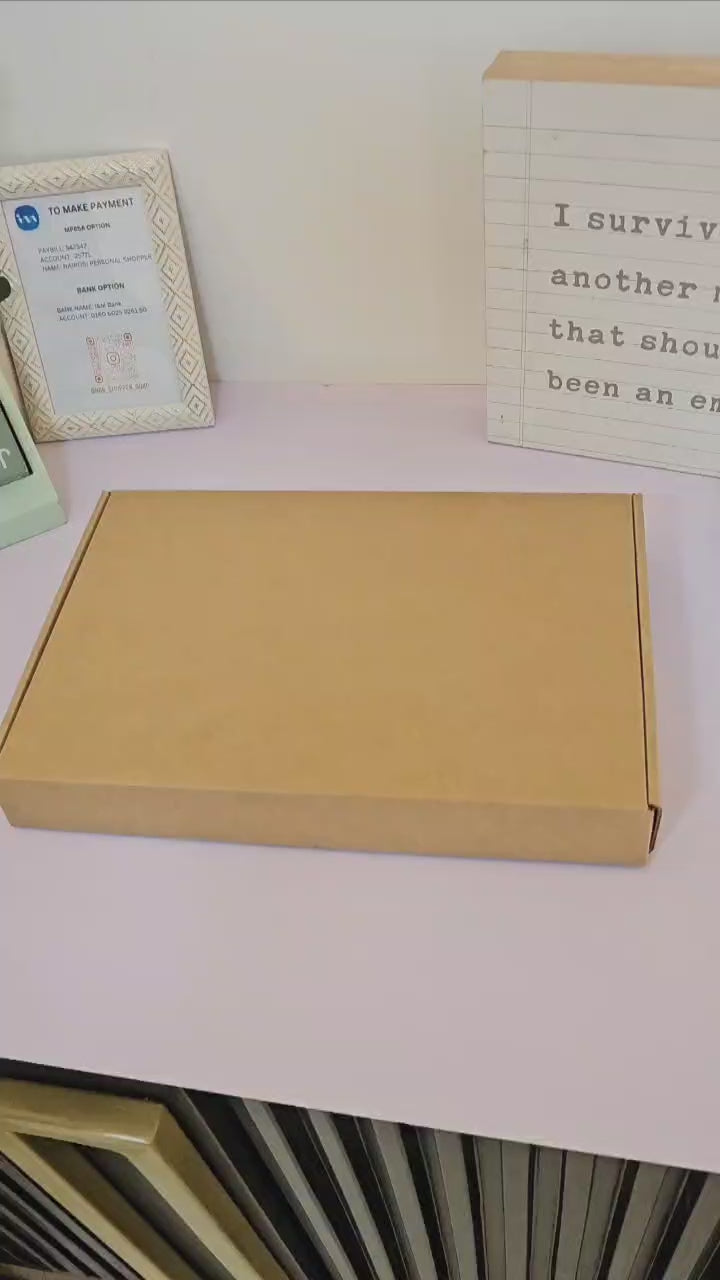 Acrylic desk planner with wooden holder.