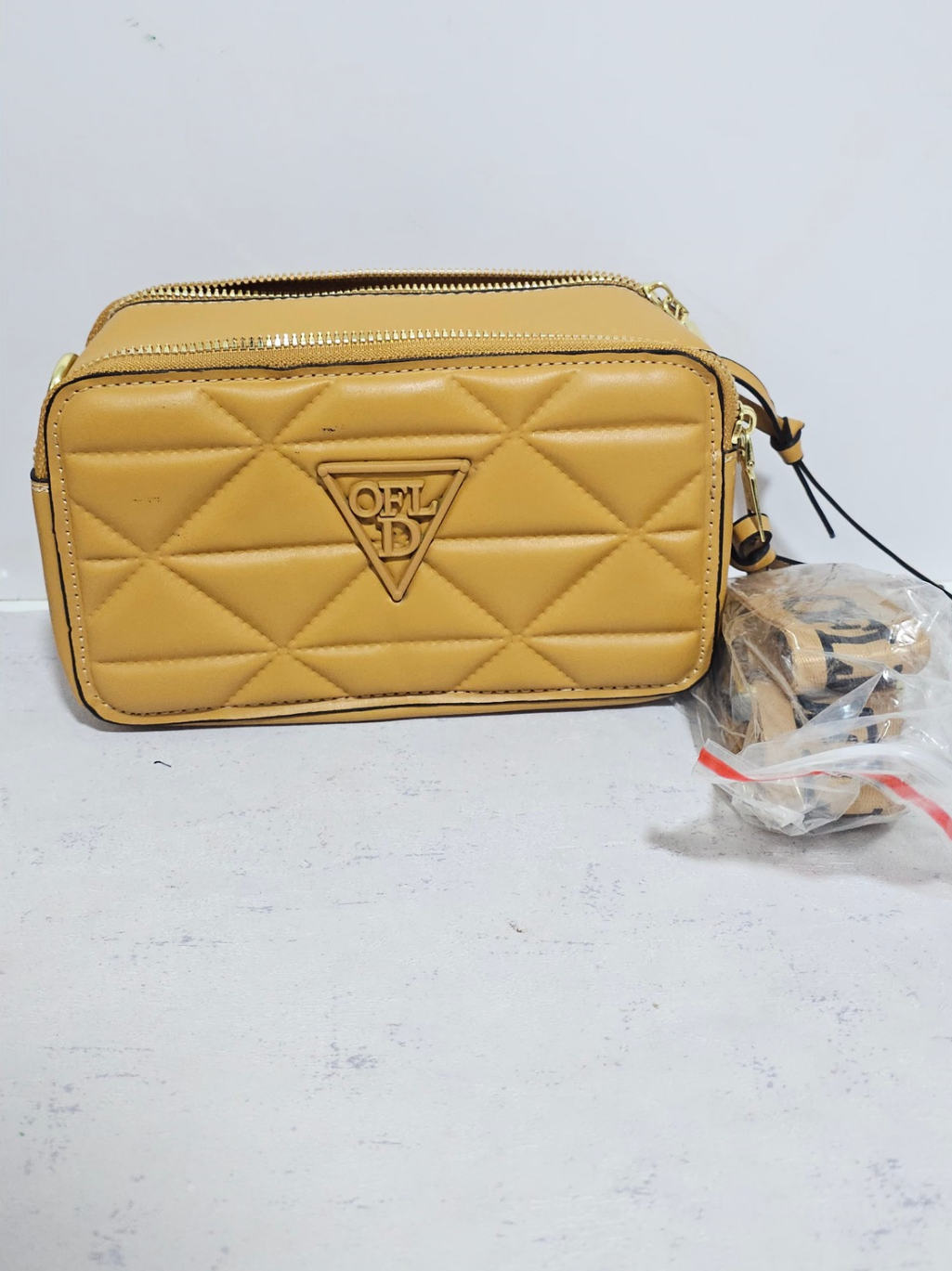 Yellow clutch bag